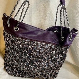 Leather Eggplant embellished purse.